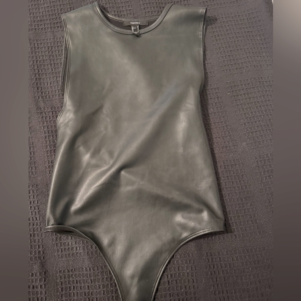 Black leather bodysuit, low arm hole